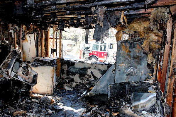 The inside of the mobile home was blackened by the blaze.