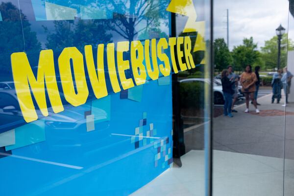 220508-Marietta-Guests wait to enter "Save the Video Store," an immersive entertainment experience set in a 1990's movie rental store in Marietta on Saturday, May 7, 2022.  Ben Gray for the Atlanta Journal-Constitution