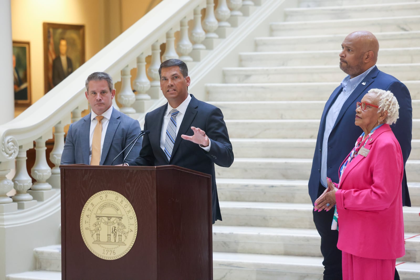 Former Republican Lt. Gov. Geoff Duncan, center, is one of the most prominent Republicans to endorse Vice President Kamala Harris' bid for the presidency. He’s scheduled to be on hand during her visit to Atlanta on Tuesday.  (Jason Getz / AJC)