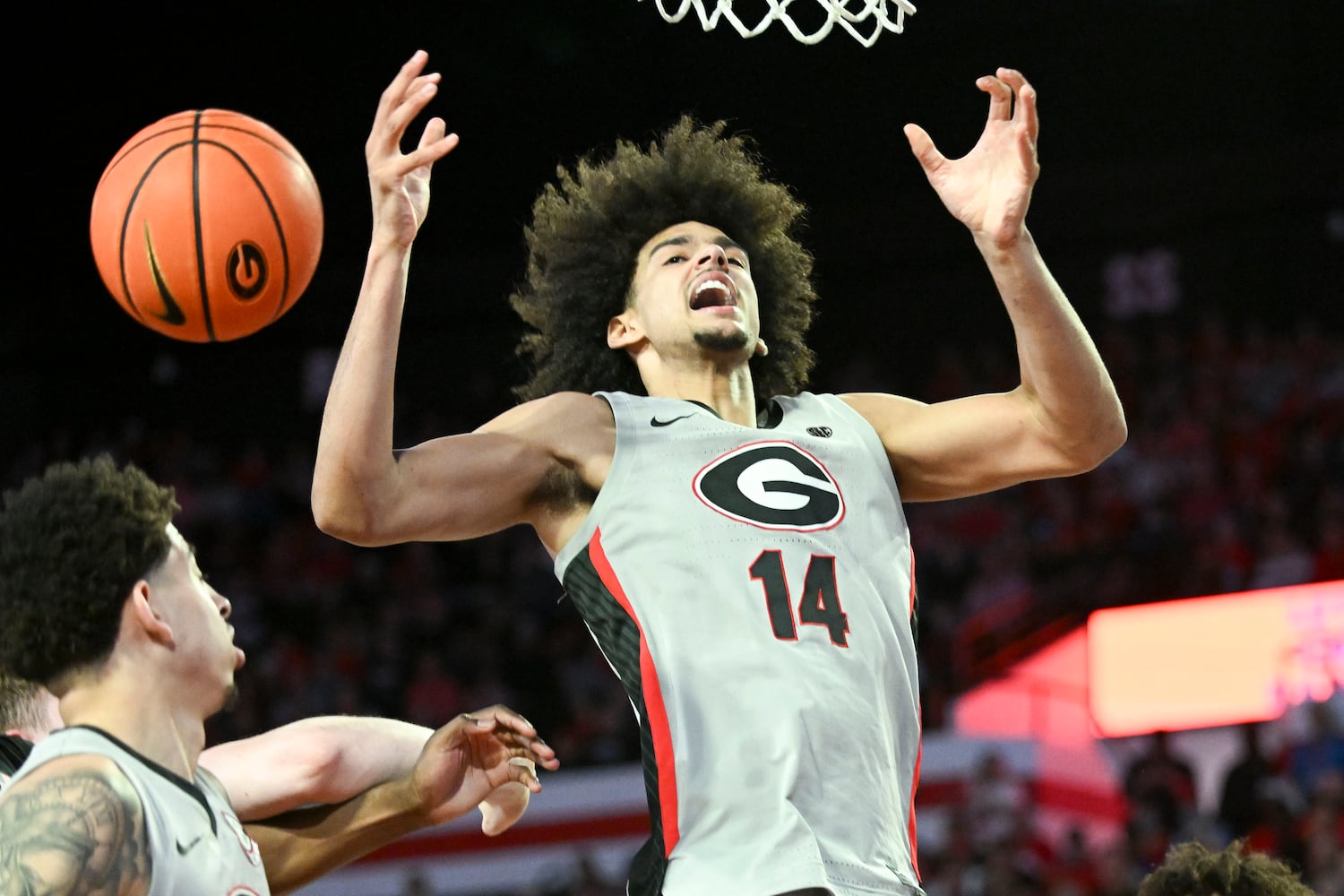 Georgia forward Asa Newell (14) us unable to maintain possession of the ball after rebounding against Vanderbilt during the first half of an NCAA Basketball game Saturday, March 8, 2025 at Stegeman Coliseum in Athens. (Daniel Varnado/For the Atlanta Journal-Constitution)