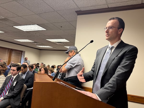 Aaron Mitchell, Georgia Power's vice president of pricing and planning, speaks against Senate Bill 34 on Tuesday, Feb. 25, 2025. The legislation would force the utility to charge energy-hungry data centers for the cost of infrastructure built to serve them. (Drew Kann/AJC)