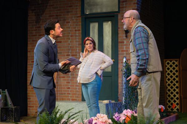 Lawyer Pablo (Braian Rivera Jimenez, left) confronts Frank (Rial Ellsworth) over a property dispute as Tania (Erika Miranda) looks on.