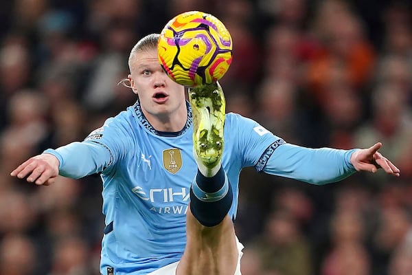 Manchester City's Erling Haaland contols the ball during the English Premier League soccer match between Liverpool and Manchester City at Anfield Stadium, Liverpool, England, Sunday Dec. 1, 2024. (Peter Byrne/PA via AP)