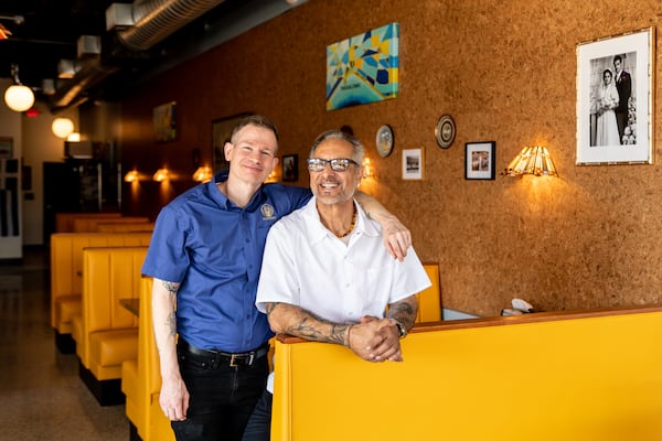 Paul Masci (left) and Johnny Gianoulidis (right) are owners of The Greek Pizzeria and Gyros. (Mia Yakel for The Atlanta Journal-Constitution)