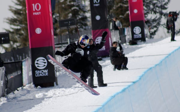 Snowboarder Maddie Mastro goes through her first qualifying run during The Snow League snowboarding competition Friday, March 7, 2025, in Aspen, Colo. (Jason Charme/The Aspen Daily News via AP)