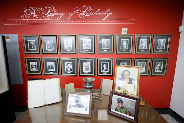 The "superintendents corner" at the APS archive museum displays a collection of photographs featuring the previous leaders of the institution, plus the current superintendent, Lisa Herring. (Miguel Martinez /miguel.martinezjimenez@ajc.com)