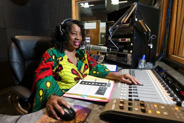 WCLK Midday Jazz host Gwen Redding, aka Riva Blue, speaks on air at their station on the lower level of the Woodruff Library on Clark Atlnata’s campus, Thursday, January 25, 2024, in Atlanta. WCLK is celebrating the 50th anniversary of Atlanta's jazz station. (Jason Getz / jason.getz@ajc.com)