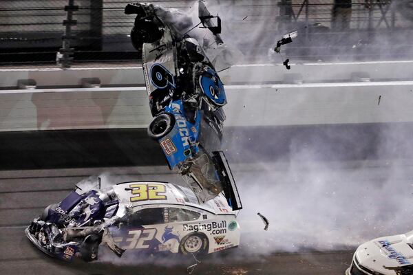 Ryan Newman (6) goes airborne after crashing into Corey LaJoie (32) during the NASCAR Daytona 500 auto race at Daytona International Speedway in Daytona Beach, Fla. Newman, who suffered a head injury in the season opening Daytona 500, will race Sunday, May 17 when NASCAR resumes its season at Darlington Raceway. (AP Photo/Chris O'Meara, File)