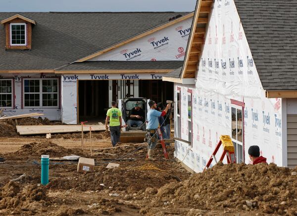 When the Federal Reserve raises short-term interest rates, it increases borrowing costs through the economy. Raise them significantly and purchases of homes would slow — as would construction. Dramatic hikes could mean job cuts and a fall in home values. (AJC file photo)