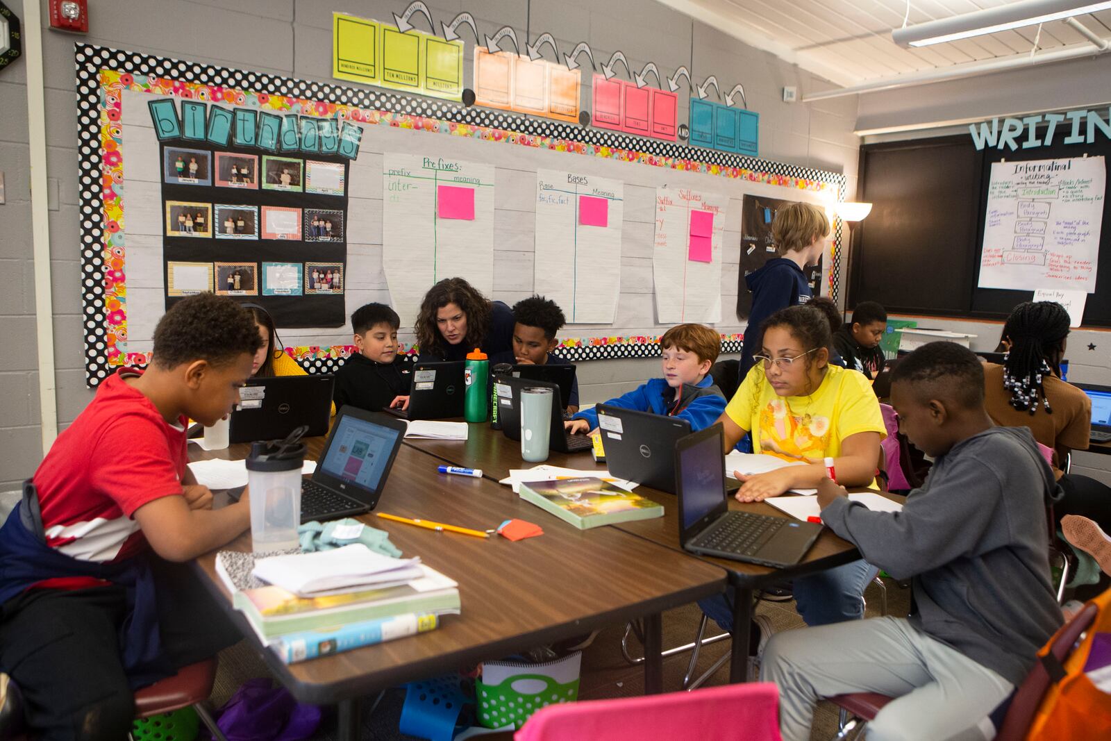 Shirley Westbrook, who works with Trisha Tanner, a fifth grade teacher at Marietta’s Hickory Hills Elementary School, gives instructions to students during class on Wednesday, Nov. 16, 2022. Marietta City Schools, like school systems across the country, is working to overcome learning loss caused by the pandemic. (Christina Matacotta for The Atlanta Journal-Constitution)