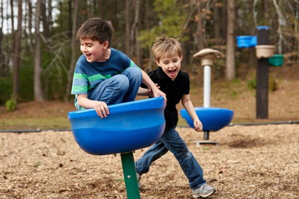 Gavi Surden (wearing stripes) is one of the youths attending the Marcus Autism Center. He’s part of a photo series on the Marcus and Children’s Healthcare of Atlanta Facebook pages to raise awareness about autism spectrum disorder. With Gavi in this photo is his brother Noah. CONTRIBUTED