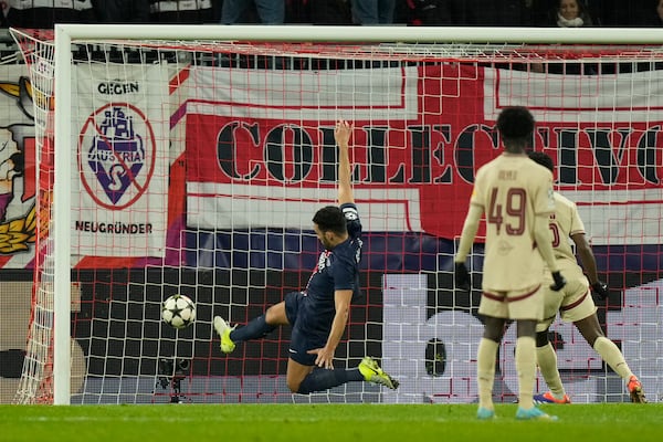 PSG's Goncalo Ramos scores his team's first goal against FC Salzburg during a Champions League opening match in Salzburg, Austria, on Tuesday, December 10, 2024. (AP Photo/Matthias Schrader)