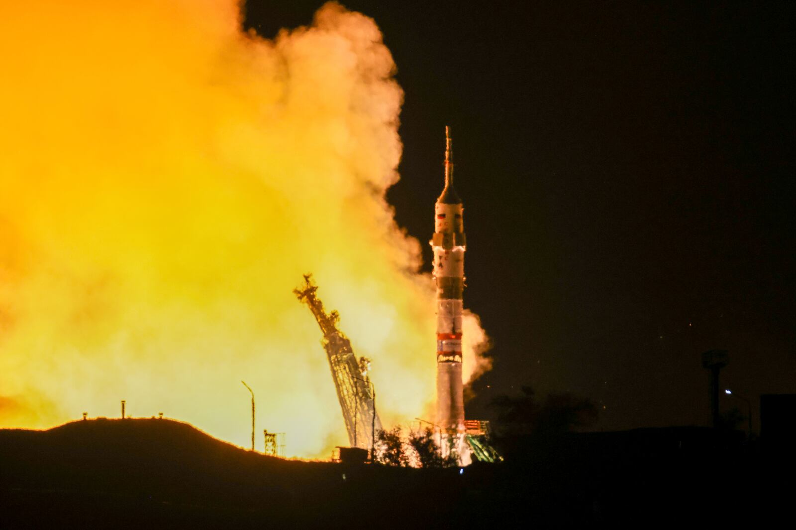 In this photo released by Roscosmos space corporation, the Soyuz-2.1 rocket booster with Soyuz MS-26 space ship carrying Roscosmos cosmonauts Alexey Ovchinin, Ivan Vagner and NASA astronaut Don Pettit, a new crew to the International Space Station, ISS, blasts off in the Russian leased Baikonur cosmodrome, Kazakhstan, Wednesday, Sept. 11, 2024. (Ivan Timoshenko, Roscosmos space corporation, via AP)