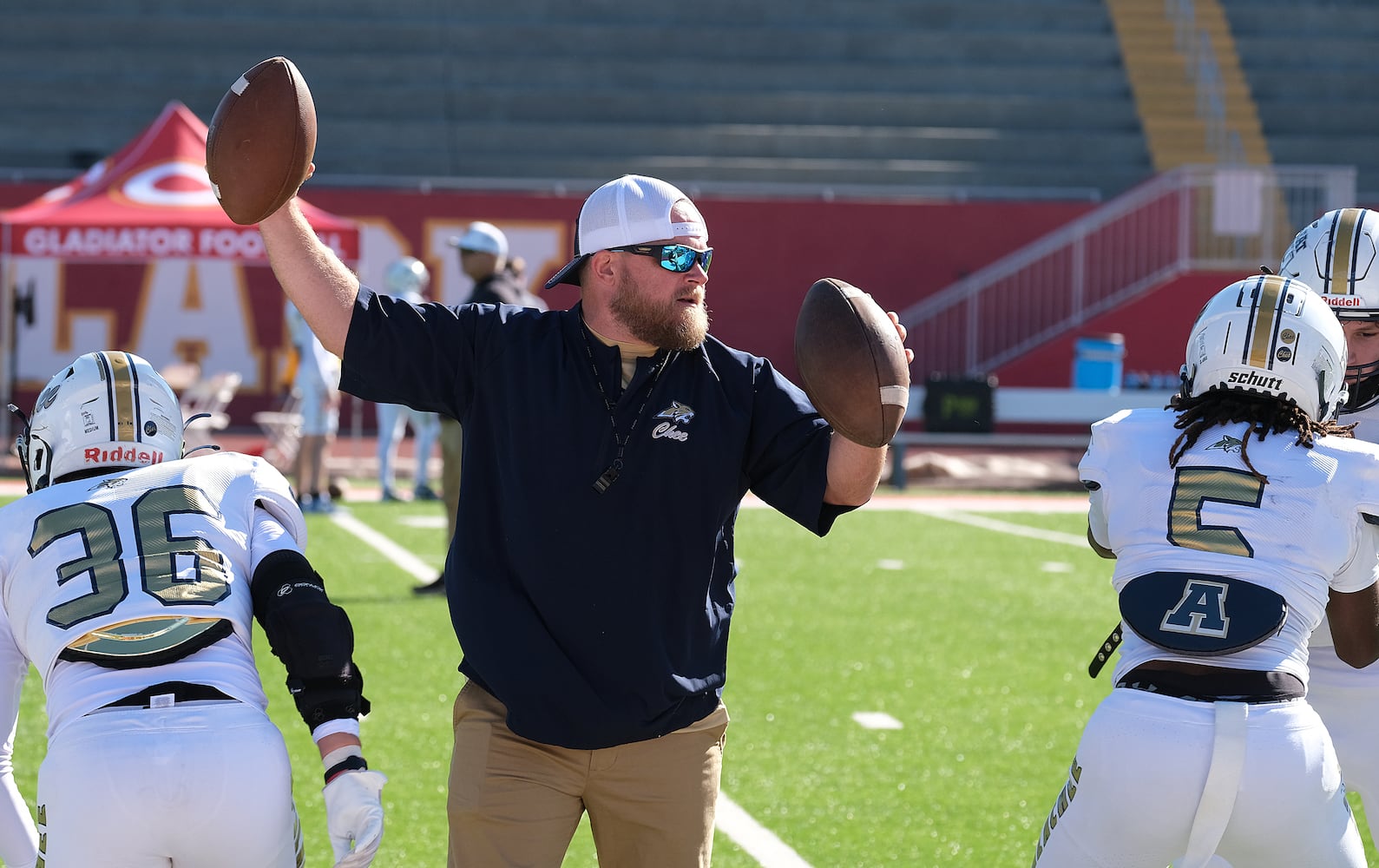 Apalachee strength coach Matt Bradley runs drills with the team before the game. 
Apalachee High School returned to the field against Athens Clarke Central Saturday September 28, 2024 in their first game since the school schooting earlier in the month.

 Nell Carroll for the Journal Constitution