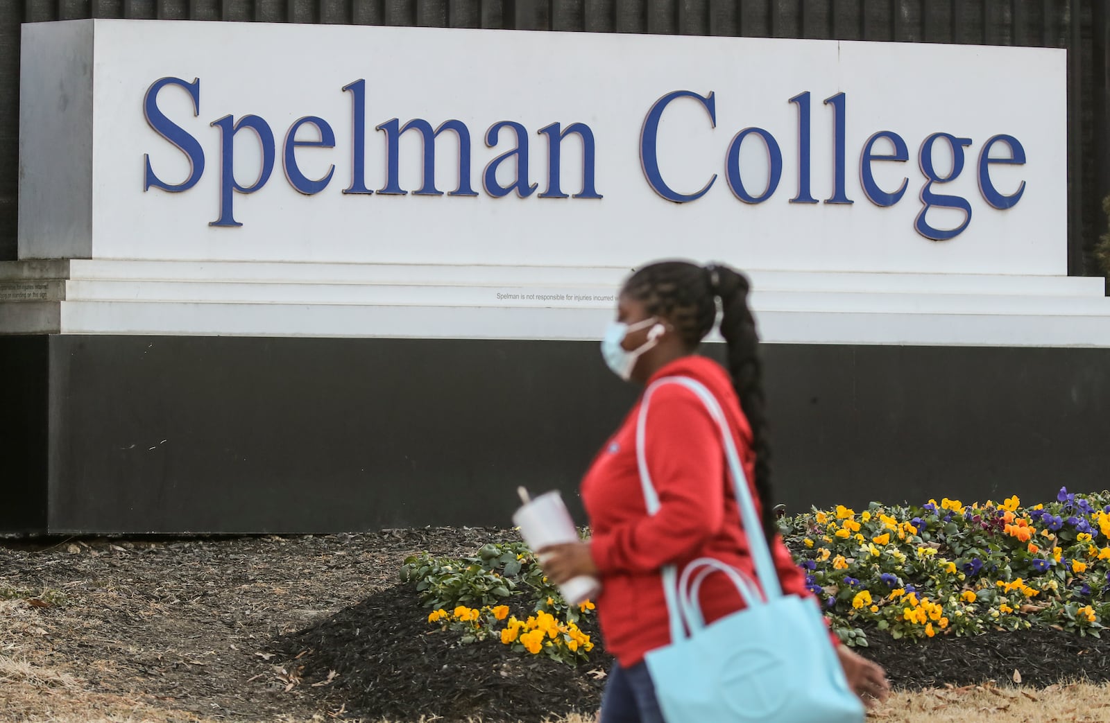 People arrived outside Atlanta's Spelman campus Tuesday morning, Feb. 1, 2022 after two historically Black colleges in Georgia received bomb threats Tuesday morning, a disturbing trend that many HBCUs across the country have been threatened with in recent weeks. (John Spink / John.Spink@ajc.com)

