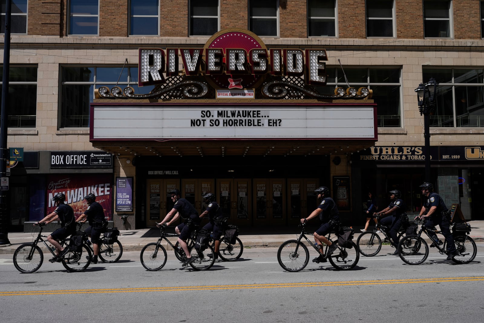 FILE - Police officers ride bikes around outside of the Republican National Convention area July 18, 2024, in Milwaukee. (AP Photo/Jae C. Hong, File)