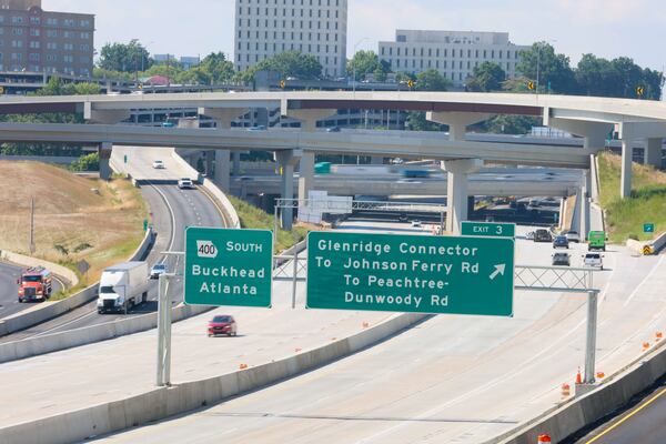 Signs advise travelers on the directions to Ga. 400 South and Glenridge connector on Monday, June 24, 2024. After seven years of work, the major reconstruction of the I-285 interchange at Ga. 400 is now substantially complete.
(Miguel Martinez / AJC)