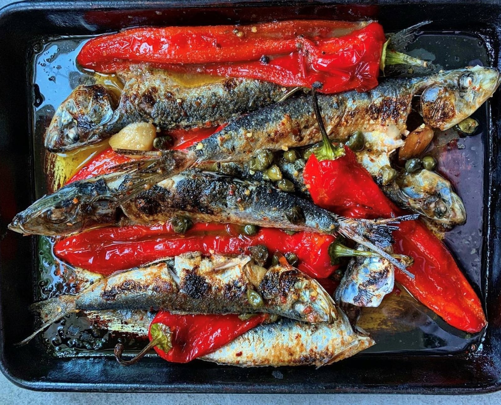 Whole-Roasted Sardines and Sweet Bell Peppers. In metro Atlanta, you might have to go to farmers markets or international markets to find fresh sardines. CONTRIBUTED BY ASHA GOMEZ