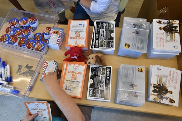 June 14, 2019 Atlanta - A few of the goodies that will be included in finishers’ bags at the end of this year’s AJC Peachtree Road Race. The bags are assembled by the Jewish Family & Career Services. HYOSUB SHIN / HSHIN@AJC.COM