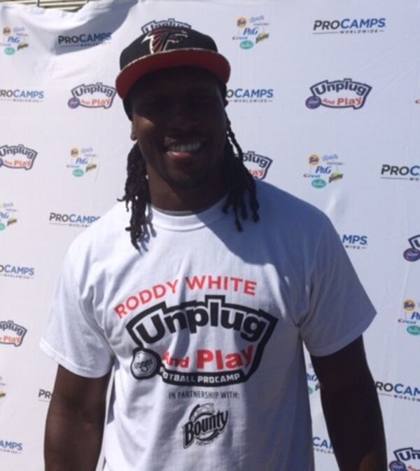 Roddy White at his youth football camp at Flowery Branch High on Sunday, June 14, 2015. He had 240 campers on hand for drills on "Championship Sunday." (By D. Orlando Ledbetter/dledbetter@ajc.com)