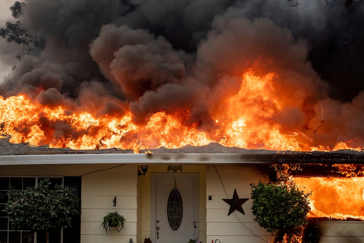 Photos: Deadly wildfires blaze through northern, southern California