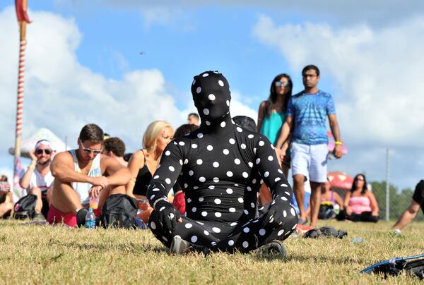 You could either be this guy at TomorrowWorld, or you could get a job and work while you're there! HYOSUB SHIN / HSHIN@AJC.COM Brad Goldring of Jacksonville, Fla., dressed for the event. HYOSUB SHIN / HSHIN@AJC.COM