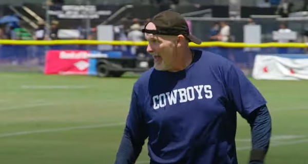 Former Falcons coach Dan Quinn instructs the defense as a member of the Dallas Cowboys coaching staff in a scene from HBO's Hard Knocks. (Image from YouTube)