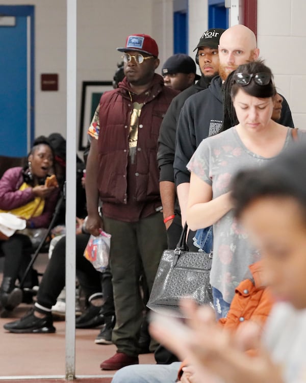 11/6/18 - Atlanta - The wait time to vote at the Pittman Park precinct in Atlanta was reported to be three hours.  Pizza and snacks were donated for the people waiting in line.   BOB ANDRES / BANDRES@AJC.COM