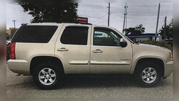 Charles Hamilton, 44, of Atlanta, may be on the run in a tan 2008 GMC Yukon with Georgia tag TRINI3. Trinidad’s flag is displayed on the front license plate, police said. (Credit: Gwinnett County Police Department)