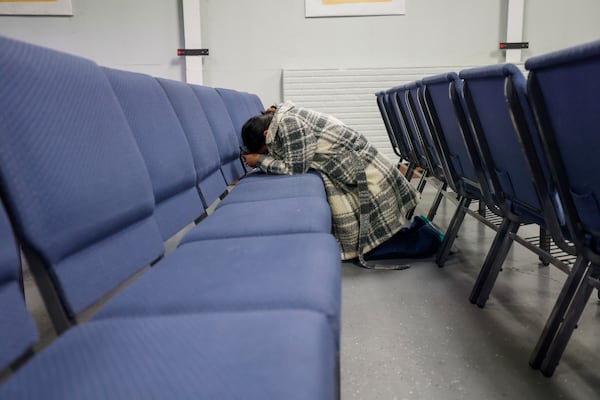 Kenia Valasquez fell to her knees and pray after finding out that her husband,  Wilson Valasquez, who is in ICE custody, has no right to a hearing before a judge and will be transferred to Stewart Detention Center for his deportation.
(Miguel Martinez/ AJC)