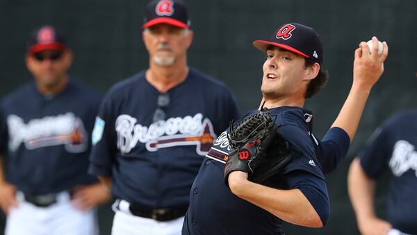 Atlanta Braves new pitching coach Rick Kranitz watches pitcher Ian Anderson work in the bullpen during spring training at the ESPN Wide World of Sports Complex on Wednesday, Feb. 20, 2019, in Lake Buena Vista.    Curtis Compton/ccompton@ajc.com