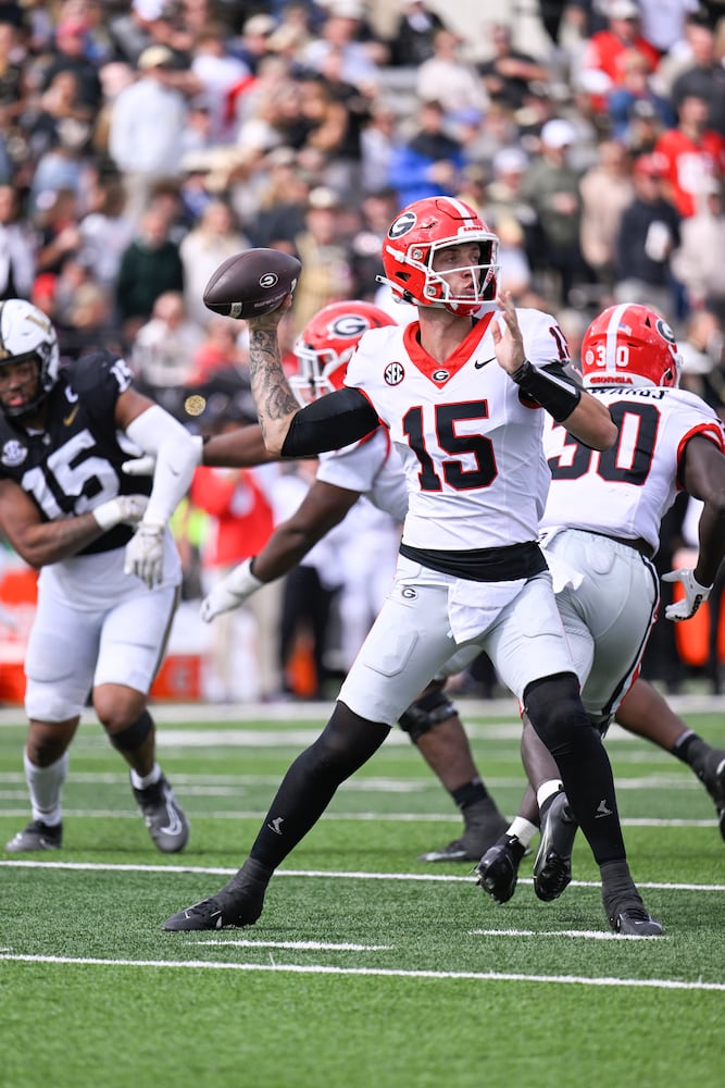 Georgia quarterback Carson Beck (15) passes during the second half of an NCAA football game against Vanderbilt, Saturday, Oct. 14, 2023, in Nashville, Tenn. Georgia won 37-20. (Special to the AJC/John Amis)