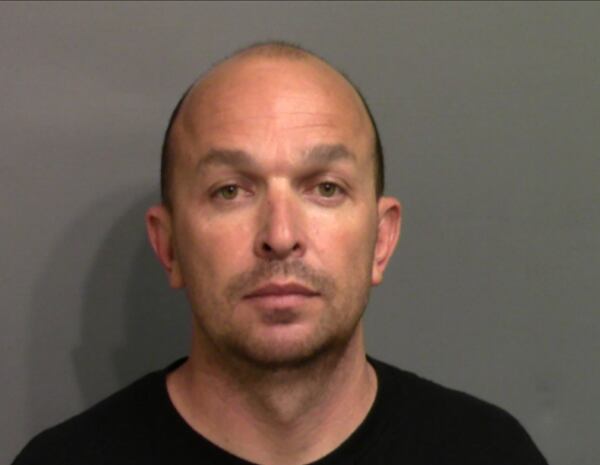 Booking mug for Robert C. Sasser when he was arrested May 13 for trying to force his way inside his estranged wife’s home. Sasser was one of two officers who shot and killed Caroline Small in June 2010.