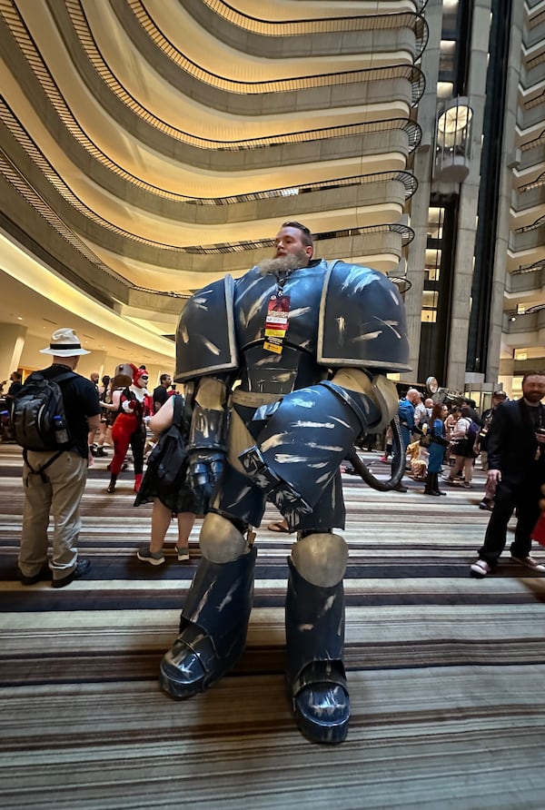 Andrew Heil, an Alabama mechanical engineer, spent three months building his space warrior costume from "Warhammer: 40,000," a tabletop wargame launched in the 1980s. RODNEY HO/rho@ajc.com