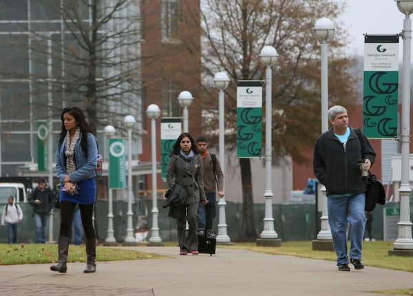 Students and others walk on the Georgia Gwinnett College campus in Lawrenceville on Dec. 3, 2013. BOB ANDRES / BANDRES@AJC.COM