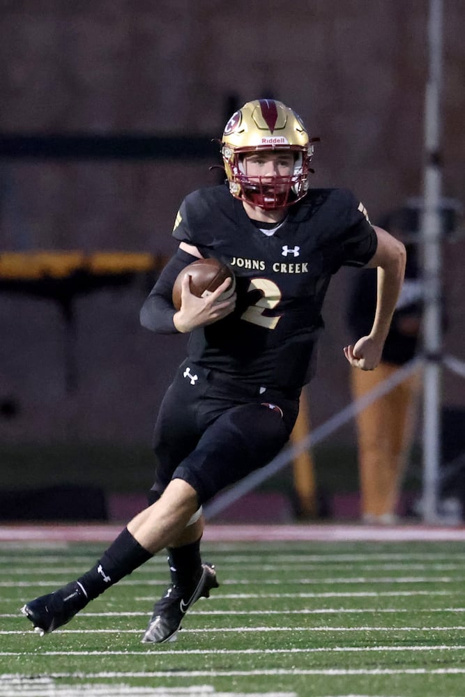 Sept. 24, 2021 - Johns Creek, Ga: Johns Creek quarterback Kyle Durham (2) runs for a long touchdown run during the first half of their game against Riverwood at Johns Creek high school Friday, September 24, 2021 in Johns Creek, Ga.. JASON GETZ FOR THE ATLANTA JOURNAL-CONSTITUTION