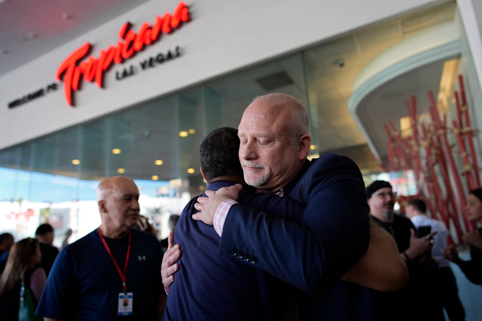 FILE - Tropicana general manager Airk Knowles, right, embraces an employee at the Tropicana hotel-casino after the property closed, Tuesday, April 2, 2024, slated for demolition in October to make room for a $1.5 billion baseball stadium, in Las Vegas. (AP Photo/John Locher, File)