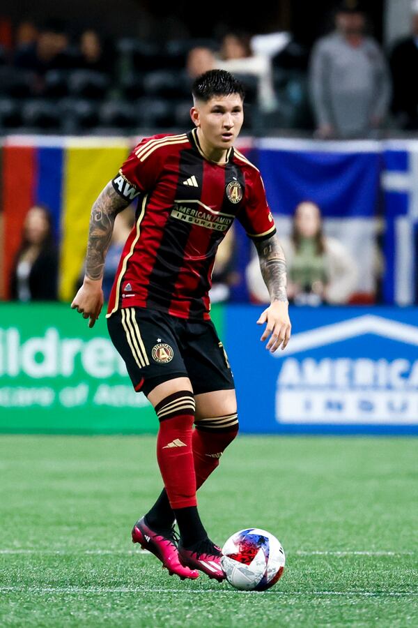 Atlanta United midfielder Franco Ibarra (14) controls the ball against San Jose during their MLS season opener at Mercedes-Benz Stadium, Saturday, Feb. 25, 2023, in Atlanta. Jason Getz / Jason.Getz@ajc.com)
