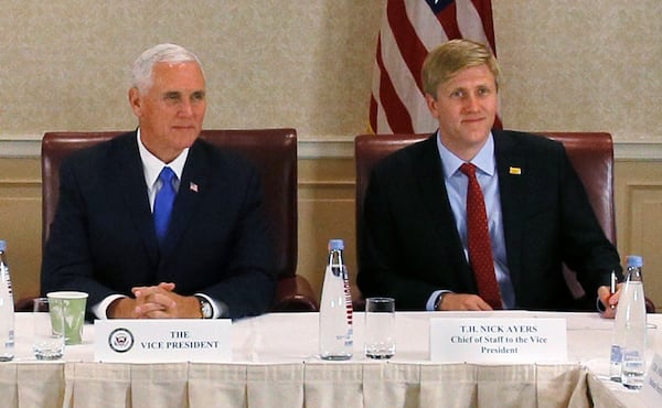  GloriFi, the “anti-woke” bank that Nick Ayers (left) co-founded, has laid off most of its employees and is set to shut down. Ayers is pictured with then Vice President Mike Pence at a 2017 event. (Zurab Kurtsikidze via AP)