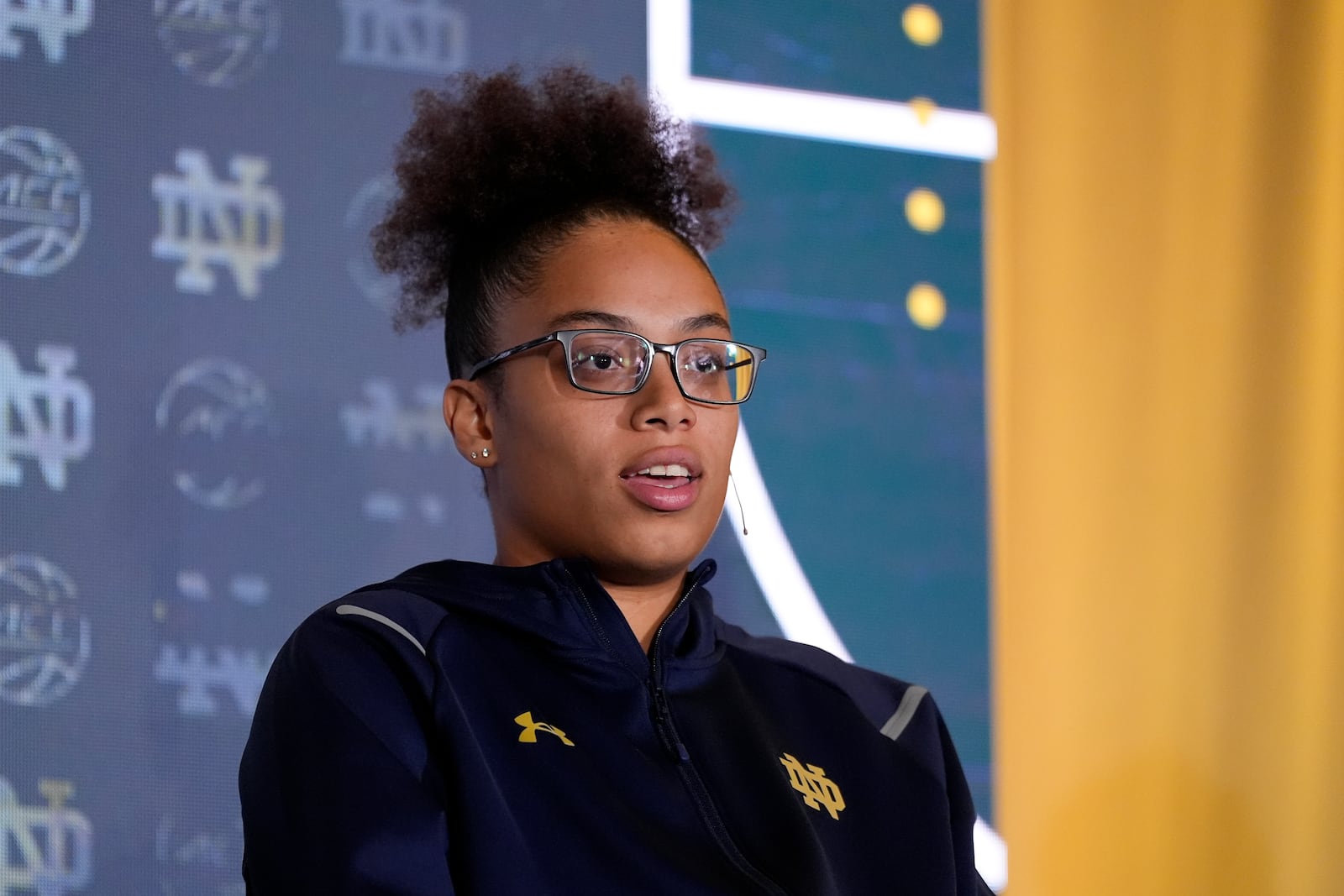 Notre Dame guard Olivia Miles speaks during a ACC women's NCAA college basketball media day, Tuesday, Oct. 8, 2024, in Charlotte, N.C. (AP Photo/Chris Carlson)