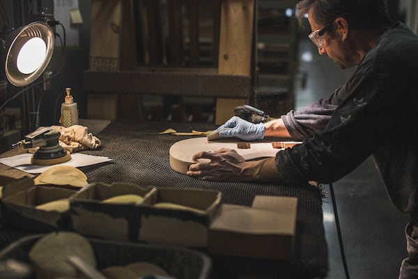 The process of creating guitars is broken down in the MODA exhibition centered on guitar construction and design, “Wire & Wood.” Contributed by PRS Guitars