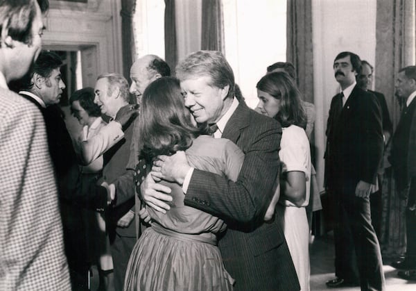 
                        FILE — An undated photo of Alice Mason and Jimmy Carter embracing during a reception at City Hall in New York. Alice Mason was New York City’s broker to the elite and a master at the art of hosting. One of her parties would strain her relationship with her daughter and reveal a secret that she couldn’t keep hidden. (Theresa Zabala/The New York Times)
                      