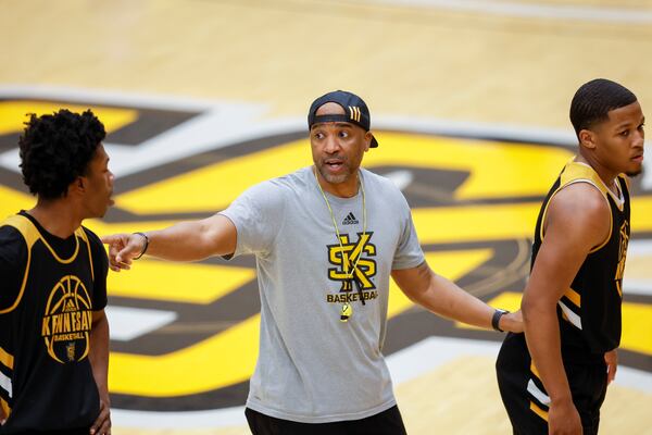 Kennesaw State's Amir Abdur-Rahim coaches during practice Tuesday. Jason Getz / Jason.Getz@ajc.com)
