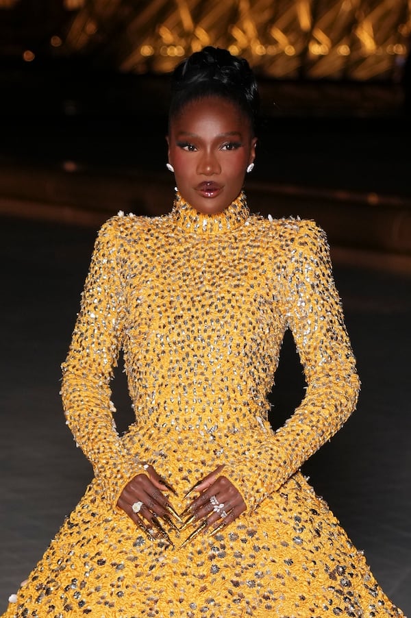 Doechii poses for photographers upon arrival for Le Grand Diner du Louvre during the Fall/Winter 2025-2026 Womenswear fashion week, Tuesday, March 4, 2025, in Paris. (Photo by Scott A Garfitt/Invision/AP)