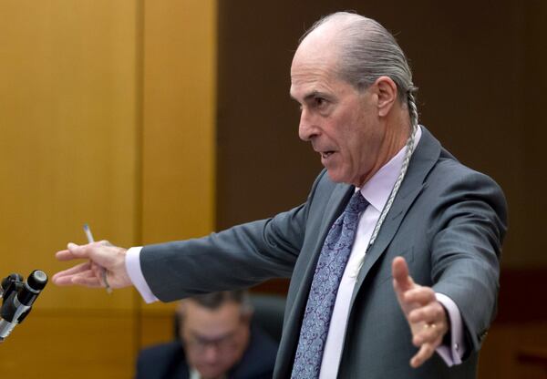 Defense attorney Bruce Harvey questions Det. Darrin Smith on the trial’s final day before the break. STEVE SCHAEFER / SPECIAL TO THE AJC