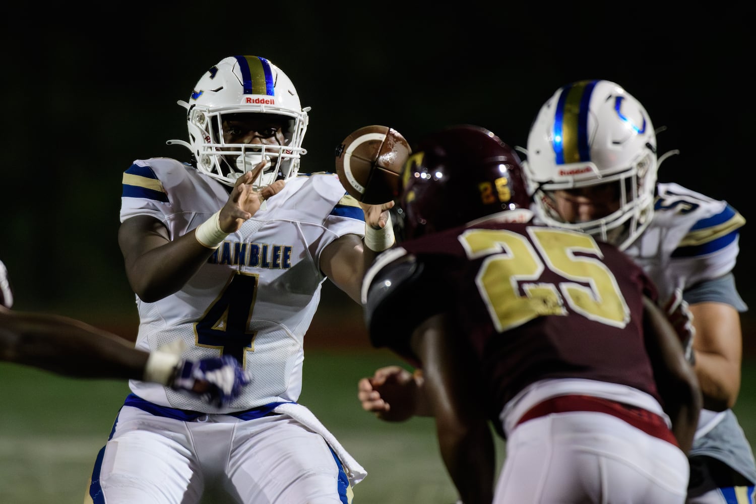 Chamblee's quarterback, Ashton Bolston, takes the snap during their game against Tucker, October 6, 2023. (Jamie Spaar for the Atlanta Journal Constitution)