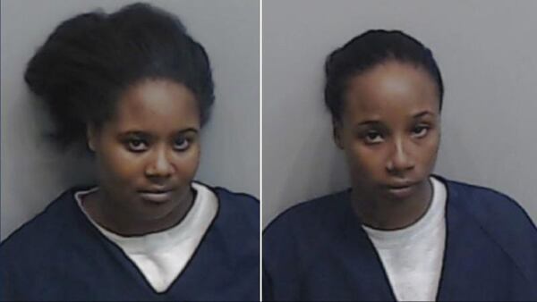 Glenndria Morris (left) and Lashirley Morris, sisters accused of killing a 3-year-old boy for eating a cupcake.