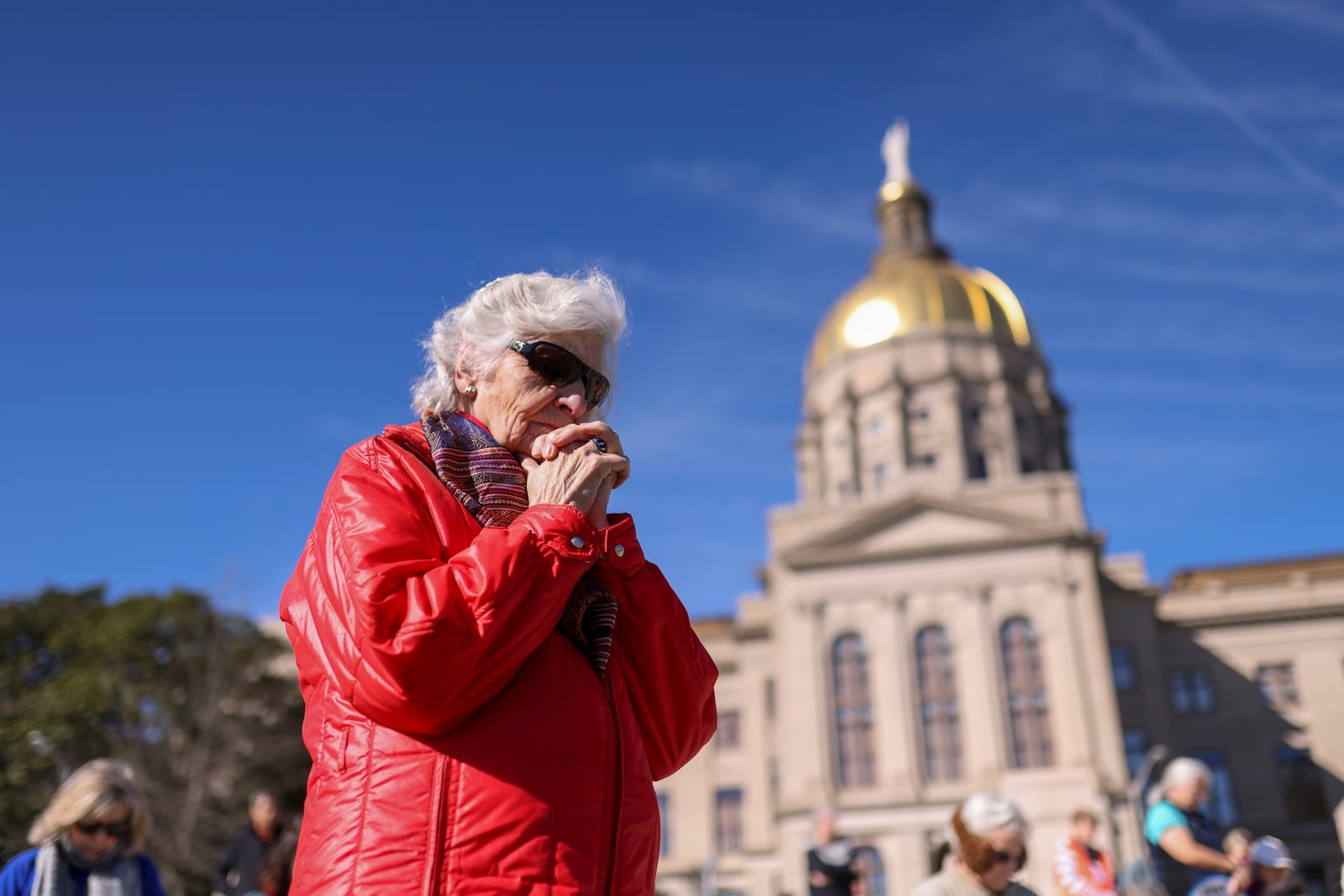 An anti-abortion advocate prays during the Georgia March for Life rally at Liberty Plaza next to the Georgia State Capitol on Jan. 20, 2023, in Atlanta. (Jason Getz/The Atlanta Journal-Constitution
)