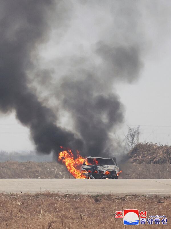 This photo provided by the North Korean government shows a burning vehicle during tests of drones designed to crash into targets, at an undisclosed location in North Korea, Thursday, Nov. 14, 2024. Independent journalists were not given access to cover the event depicted in this image distributed by the North Korean government. The content of this image is as provided and cannot be independently verified. Korean language watermark on image as provided by source reads: "KCNA" which is the abbreviation for Korean Central News Agency. (Korean Central News Agency/Korea News Service via AP)