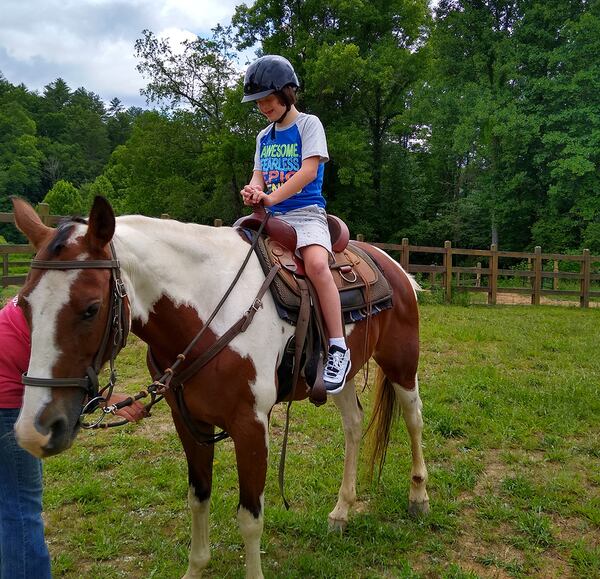 Renye Newman Finch took her son, Chase Todd, 12, to the Georgia mountains for a getaway. Chase road a horse for the first time during the trip. Photo courtesy Renye Newman Finch